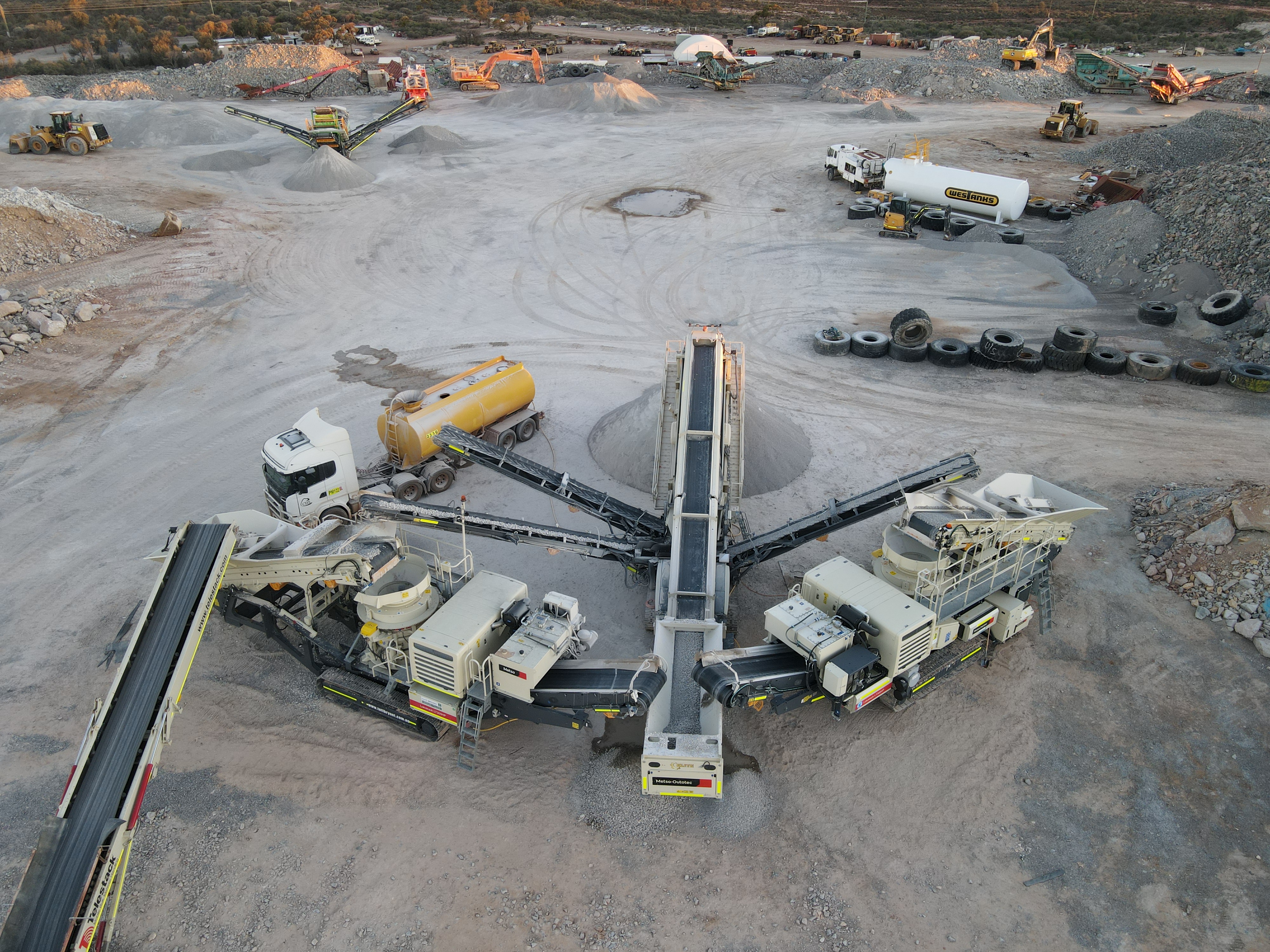 Aerial view of Elite mobile crushing operation processing historic ROM stockpile at Marvel Loch