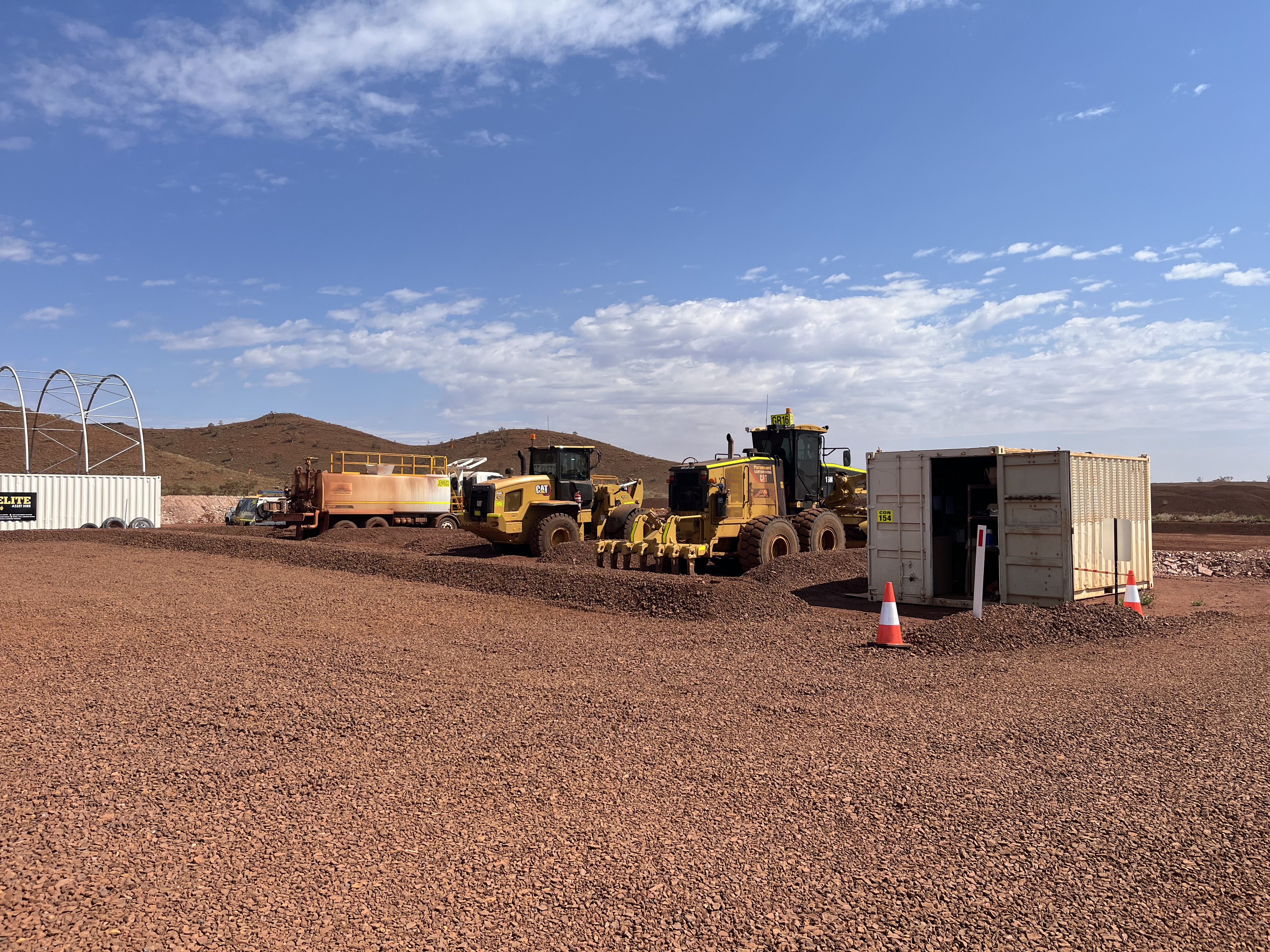 Civil fleet — grader and loader on a Kalgoorlie clean fill site